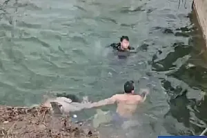 河南两名监狱民警跳河救人后说,“这一身伤痕,值得”